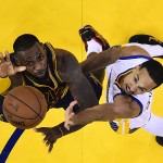 
              Cleveland Cavaliers forward LeBron James, left, reaches for the ball next to Golden State Warriors guard Shaun Livingston during the second half of Game 5 of basketball's NBA Finals in Oakland, Calif., Sunday, June 14, 2015. The Warriors won 104-91. (John G. Mabanglo/EPA Pool via AP)
            