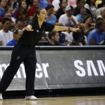               Becky Hammon coaches the San Antonio Spurs against the Phoenix Suns in an NBA summer league championship basketball game Monday, July 20, 2015, in Las Vegas. (AP Photo/John Locher)
            