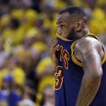 
              Cleveland Cavaliers forward LeBron James wipes his face during the second half of Game 2 of basketball's NBA Finals against the Golden State Warriors in Oakland, Calif., Sunday, June 7, 2015. (AP Photo/Ben Margot)
            
