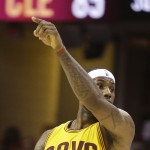 
              Cleveland Cavaliers forward LeBron James (23) motions to teammates against the Chicago Bulls during the second half of Game 2 in a second-round NBA basketball playoff series Wednesday, May 6, 2015, in Cleveland. (AP Photo/Tony Dejak)
            