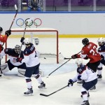 Canada forward Benn Jamie scores a goal during a men's semifinal ice hockey game against the USA at the 2014 Winter Olympics, Friday, Feb. 21, 2014, in Sochi, Russia. (AP Photo/David J. Phillip )