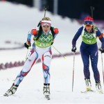 Czech Republic's Gabriela Soukalova, left, and Norway's Tiril Eckhoff ski during the women's biathlon 4x6k relay, at the 2014 Winter Olympics, Friday, Feb. 21, 2014, in Krasnaya Polyana, Russia. (AP Photo/Dmitry Lovetsky)