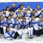 Team Finland pose for a photo with their medals after the men's bronze medal ice hockey game at the 2014 Winter Olympics, Saturday, Feb. 22, 2014, in Sochi, Russia. (AP Photo/Matt Slocum)
