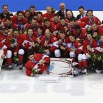 Members of Team Canada pose for a photo after the medals ceremony in the men's gold medal ice hockey game at the 2014 Winter Olympics, Sunday, Feb. 23, 2014, in Sochi, Russia. Canada defeated Sweden 3-0 to win the gold. (AP Photo/Petr David Josek)