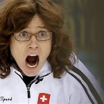 Switzerland's skip Mirjam Ott shouts instructions to her team during the women's curling competition against Britain at the 2014 Winter Olympics, Saturday, Feb. 15, 2014, in Sochi, Russia. (AP Photo/Wong Maye-E)