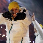 A member of the Australian team cheers as he enters the stadium during the opening ceremony of the 2014 Winter Olympics in Sochi, Russia, Friday, Feb. 7, 2014. (AP Photo/Patrick Semansky)