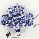 Finland players celebrate after their 5-0 win over USA in the men's bronze medal ice hockey game at the 2014 Winter Olympics, Saturday, Feb. 22, 2014, in Sochi, Russia. (AP Photo/David J. Phillip)
