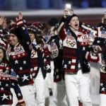 Athletes from the United States wave to spectators as they arrive during the opening ceremony of the 2014 Winter Olympics in Sochi, Russia, Friday, Feb. 7, 2014. (AP Photo/Mark Humphrey)