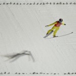 Norway's Anders Jacobsen makes an attempt from the normal hill at the men's ski jumping at the 2014 Winter Olympics, Thursday, Feb. 6, 2014, in Krasnaya Polyana, Russia. (AP Photo/Gregorio Borgia)