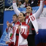 Ksenia Stolbova and Fedor Klimov of Russia react after competing in the team pairs free skate figure skating competition at the Iceberg Skating Palace during the 2014 Winter Olympics, Saturday, Feb. 8, 2014, in Sochi, Russia. (AP Photo/Darron Cummings, Pool)
