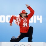 Women's biathlon 15K individual gold medalist Darya Domracheva of Belarus celebrates during the medals ceremony at the 2014 Winter Olympics, Saturday, Feb. 15, 2014, in Sochi, Russia. (AP Photo/David J. Phillip, File)
