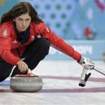 Great Britain's skip Eve Muirhead delivers the rock during the women's curling competition against the United States at the 2014 Winter Olympics, Tuesday, Feb. 11, 2014, in Sochi, Russia. (AP Photo/Wong Maye-E)