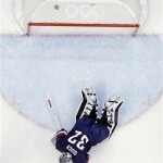 USA goaltender Jonathan Quick lays on the ice after giving up a goal during the third period of the men's bronze medal ice hockey game against Finland at the 2014 Winter Olympics, Saturday, Feb. 22, 2014, in Sochi, Russia. (AP Photo/David J. Phillip)