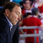 NHL Commissioner Gary Bettman watches the game between Sweden and Canada in the gold medal men's ice hockey game at the 2014 Winter Olympics, Sunday, Feb. 23, 2014, in Sochi, Russia. (AP Photo/Mark Humphrey)