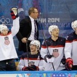 Team USA player reacts from the bench after a goal by forward Phil Kessel during the third period of men's quarterfinal hockey game against the Czech Republic in Shayba Arena at the 2014 Winter Olympics, Wednesday, Feb. 19, 2014, in Sochi, Russia. (AP Photo/David J. Phillip )