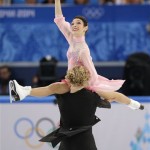 Meryl Davis and Charlie White of the United States compete in the ice dance short dance figure skating competition at the Iceberg Skating Palace during the 2014 Winter Olympics, Sunday, Feb. 16, 2014, in Sochi, Russia. (AP Photo/Vadim Ghirda)