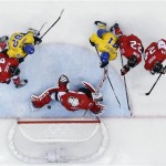 Canada goaltender Carey Price blocks a shot during the first period of the men's gold medal ice hockey game against Sweden at the 2014 Winter Olympics, Sunday, Feb. 23, 2014, in Sochi, Russia. (AP Photo/David J. Phillip)