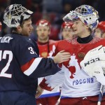 USA goaltender Jonathan Quick, left, greets Russia goaltender Sergei Bobrovski after the US beat Russia in a shootout during overtime of a men's ice hockey game at the 2014 Winter Olympics, Saturday, Feb. 15, 2014, in Sochi, Russia. (AP Photo/Mark Humphrey)