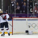 USA defenseman Kevin Shattenkirk reacts after losing to Canada 1-0 in a men's semifinal ice hockey game at the 2014 Winter Olympics, Friday, Feb. 21, 2014, in Sochi, Russia. (AP Photo/Julio Cortez)
