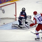 Russia forward Pavel Datsyuk watches his shot cross the goal line for a score against USA goaltender Jonathan Quick in the second period of a men's ice hockey game at the 2014 Winter Olympics, Saturday, Feb. 15, 2014, in Sochi, Russia. (AP Photo/Petr David Josek)