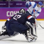 Finland defenseman Olli Maatta shoots to score against USA goaltender Jonathan Quick during the third period of the men's bronze medal ice hockey game at the 2014 Winter Olympics, Saturday, Feb. 22, 2014, in Sochi, Russia. (AP Photo/Petr David Josek)