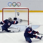 USA goaltender Jonathan Quick and defenseman can't stop a goal by Finland's Sami Salo of the men's bronze medal ice hockey game at the 2014 Winter Olympics, Saturday, Feb. 22, 2014, in Sochi, Russia. (AP Photo/David J. Phillip)