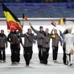 Hanna Emilie Marien of Belgium carries the national flag as she leads the team during the opening ceremony of the 2014 Winter Olympics in Sochi, Russia, Friday, Feb. 7, 2014. (AP Photo/Mark Humphrey)