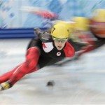 Valerie Maltais of Canada competes in a women's 1000m short track speedskating quarterfinal at the Iceberg Skating Palace during the 2014 Winter Olympics, Friday, Feb. 21, 2014, in Sochi, Russia. (AP Photo/Bernat Armangue)