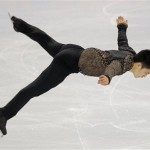  Denis Ten of Kazakhstan competes in the men's short program figure skating competition at the Iceberg Skating Palace at the 2014 Winter Olympics, Thursday, Feb. 13, 2014, in Sochi, Russia. (AP Photo/Vadim Ghirda)