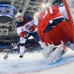 USA forward David Backes reacts as forward Zach Parise goal shot gets by Czech Republic goaltender Ondrej Pavelec during the second period of men's quarterfinal hockey game in Shayba Arena at the 2014 Winter Olympics, Wednesday, Feb. 19, 2014, in Sochi, Russia. (AP Photo/Brian Snyder, Pool)