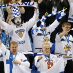Finland fans celebrates a goal against Norway during the 2014 Winter Olympics men's ice hockey game at Shayba Arena, Friday, Feb. 14, 2014, in Sochi, Russia. (AP Photo/Petr David Josek)