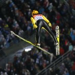 Japan's Noriaki Kasai makes his first attempt during the ski jumping large hill final at the 2014 Winter Olympics, Saturday, Feb. 15, 2014, in Krasnaya Polyana, Russia. (AP Photo/Dmitry Lovetsky)