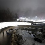 Fog settles in the Sanki Sliding Center during the men's two-man bobsled competition at the 2014 Winter Olympics, Sunday, Feb. 16, 2014, in Krasnaya Polyana, Russia. (AP Photo/Natacha Pisarenko)