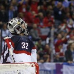 USA goaltender Jonathan Quick reacts after Canada scored a goal during the second period of a men's semifinal ice hockey game at the 2014 Winter Olympics, Friday, Feb. 21, 2014, in Sochi, Russia. (AP Photo/Julio Cortez)