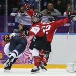 Marie-Philip Poulin of Canada (29) reacts after scoring a goal to tie the score against the USA during the third period of the women's gold medal ice hockey game at the 2014 Winter Olympics, Thursday, Feb. 20, 2014, in Sochi, Russia. (AP Photo/Mark Humphrey)