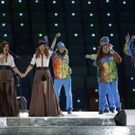 Russian duo t.A.T.u. Lena Katina, third from left, and Yulia Volkova, second from left, perform on stage before the opening ceremony of the 2014 Winter Olympics in Sochi, Russia, Friday, Feb. 7, 2014. (AP Photo/Mark Humphrey)