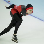 China's Wang Beixing competes in the second heat of the women's 500-meter speedskating race at the Adler Arena Skating Center during the 2014 Winter Olympics, Tuesday, Feb. 11, 2014, in Sochi, Russia. (AP Photo/Patrick Semansky)