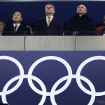 Russian President Vladimir Putin, second from right, International Olympic Committee President Thomas Bach, centre, and United Nations Secretary-General Ban Ki-moon, third from left, attend the opening ceremony of the 2014 Winter Olympics in Sochi, Russia, Friday, Feb. 7, 2014. (AP Photo/Mark Humphrey)
