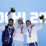Medalists in the men's biathlon 15K mass start, from left, France's Martin Fourcade, silver, Norway's Emil Hegle Svendsen, gold, and the Czech Republic's Ondrej Moravec, bronze, pose with their medals at the 2014 Winter Olympics in Sochi, Russia, Tuesday, Feb. 18, 2014. (AP Photo/David Goldman)