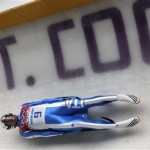 Armin Zoeggeler of Italy takes a turn on his final run during the men's singles luge final at the 2014 Winter Olympics, Sunday, Feb. 9, 2014, in Krasnaya Polyana, Russia. Zoeggeler won the bronze. (AP Photo/Dita Alangkara)