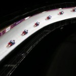 In this image made with a multiple exposure, Yun Sung-bin of South Korea speeds down the track during the men's skeleton final competition at the 2014 Winter Olympics, Saturday, Feb. 15, 2014, in Krasnaya Polyana, Russia. (AP Photo/Felipe Dana)