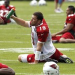 Arizona Cardinals' John Skelton (19) takes a drink during team stretches during NFL training camp football practice at Northern Arizona University Friday, July 27, 2012, in Flagstaff, Ariz.(AP Photo/Ross D. Franklin)