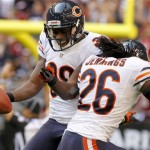 Chicago Bears defensive back Zack Bowman (38) celebrates his touchdown with teammate Tim Jennings (26) against the Arizona Cardinals during the first half of an NFL football game, Sunday, Dec. 23, 2012, in Glendale, Ariz. (AP Photo/Rick Scuteri)