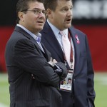 Washington Redskins owner Daniel Snyder, left, stands next to Arizona Cardinals team president Michael Bidwill, right, prior to an NFL football game Sunday, Oct. 12, 2014, in Glendale, Ariz. (AP Photo/Ross D. Franklin)