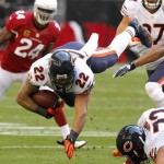 Chicago Bears running back Matt Forte (22) is tripped up against the Arizona Cardinals during the first half of an NFL football game, Sunday, Dec. 23, 2012, in Glendale, Ariz. (AP Photo/Rick Scuteri)