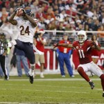 Chicago Bears cornerback Kelvin Hayden (24) makes the interception in front of Arizona Cardinals wide receiver Larry Fitzgerald (11) during the second half of an NFL football game, Sunday, Dec. 23, 2012 in Glendale, Ariz. (AP Photo/Rick Scuteri)
