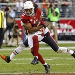 Arizona Cardinals wide receiver Larry Fitzgerald (11) pulls in a pass against the Chicago Bears during the second half of an NFL football game, Sunday, Dec. 23, 2012, in Glendale, Ariz. (AP Photo/Rick Scuteri)
