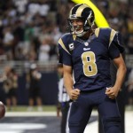 St. Louis Rams quarterback Sam Bradford celebrates after scoring a two-point conversion during the fourth quarter of an NFL football game against the Arizona Cardinals, Sunday, Sept. 8, 2013, in St. Louis. (AP Photo/L.G. Patterson)