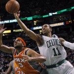 Boston Celtics shooting guard Courtney Lee (11) drives to the hoop against Phoenix Suns guard Jared Dudley (3) during the first quarter of an NBA basketball game in Boston, Wednesday, Jan. 9, 2013. (AP Photo/Elise Amendola)
