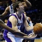 Oklahoma City Thunder forward Kevin Durant, left, reaches in and knocks the ball away from Phoenix Suns guard Goran Dragic, right, in the first quarter of an NBA basketball game in Oklahoma City, Monday, Dec. 31, 2012. (AP Photo/Sue Ogrocki)